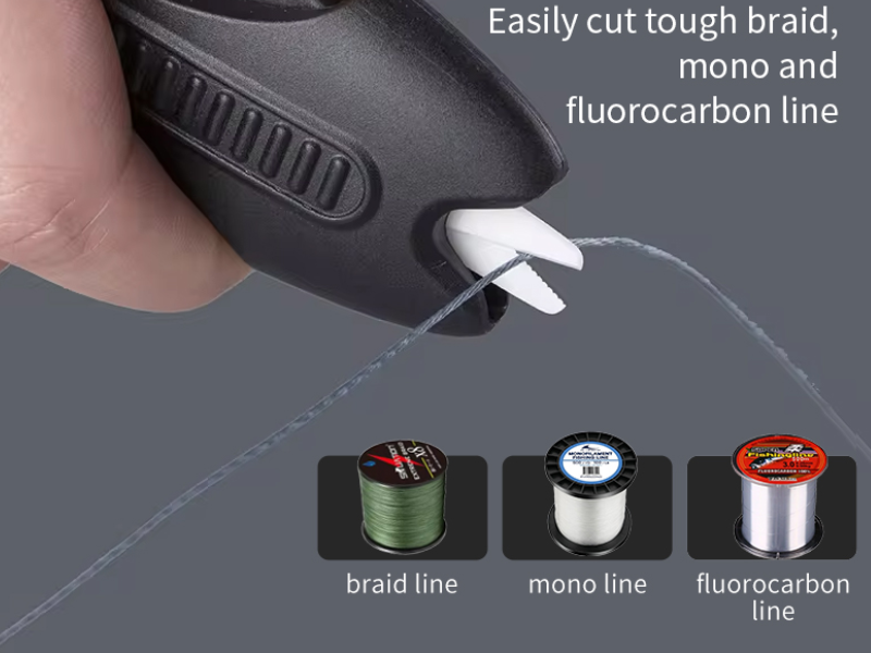 Handheld black fishing line cutter cutting through braided, monofilament, and fluorocarbon lines easily