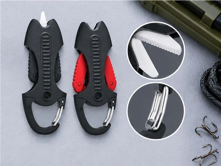 Rustproof ceramic fishing braid scissors showing serrated blade and carabiner clip details