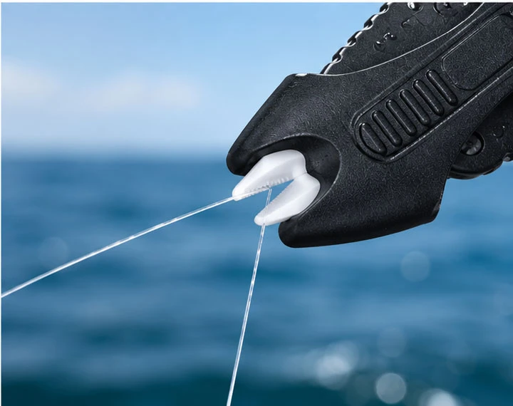 Ceramic fishing line cutter positioned around fishing line for product performance evaluation